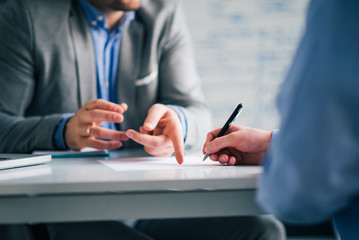 Fleet compliance consultant reviewing driver qualification files