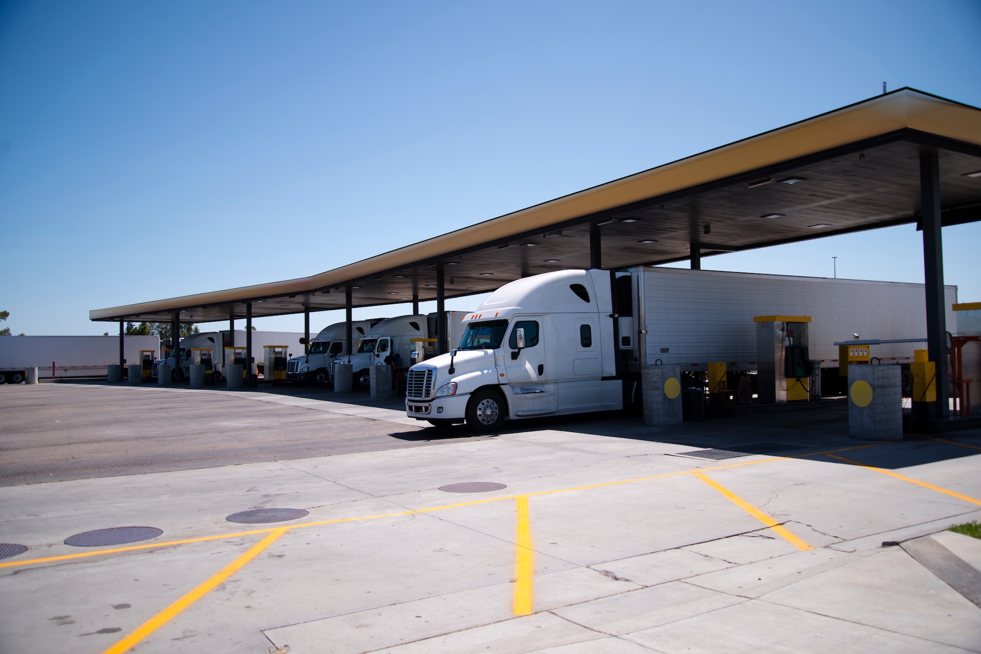 Commercial truck fueling at interstate truck stop for IFTA compliance