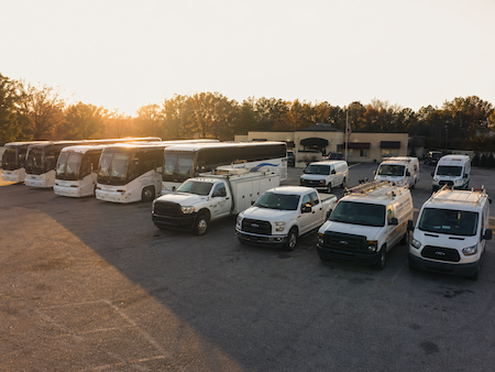 Mid-sized commercial fleet at a yard — the typical operation served by LBC Fleet's outsourced fleet management services