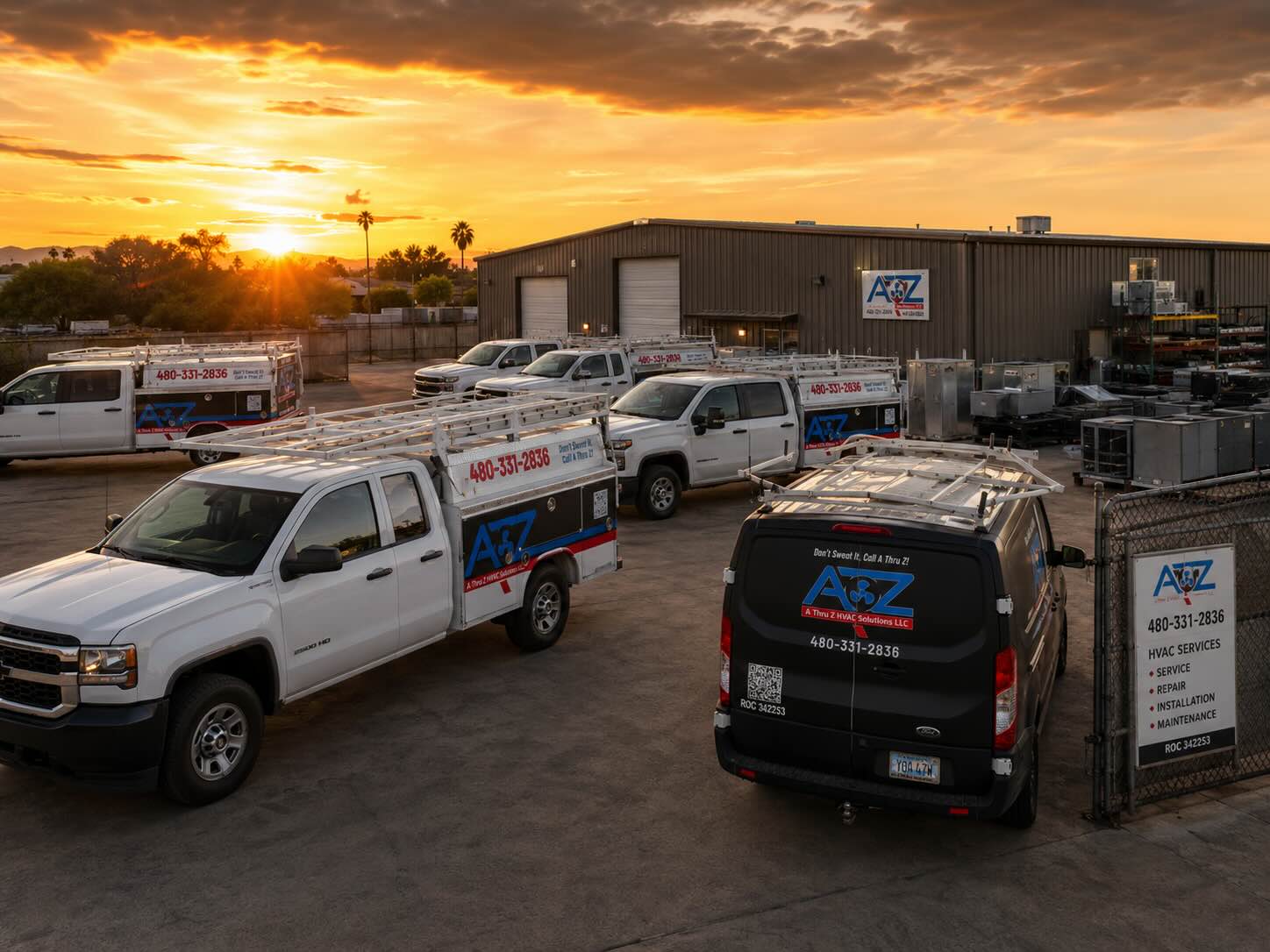 Fleet management for HVAC companies in action — HVAC service fleet staged in company yard